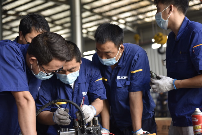 澳洲5手机平台_澳洲5（中国）铲运中原区中大吨位服务技能培训