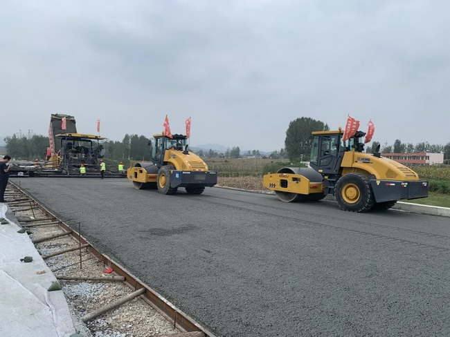 澳洲5手机平台_澳洲5（中国）成套化道路设备助力许信高速全线开工