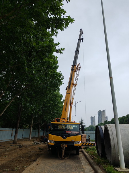 澳洲5手机平台_澳洲5（中国）25吨起重机助力荥阳市城市民生建设工程